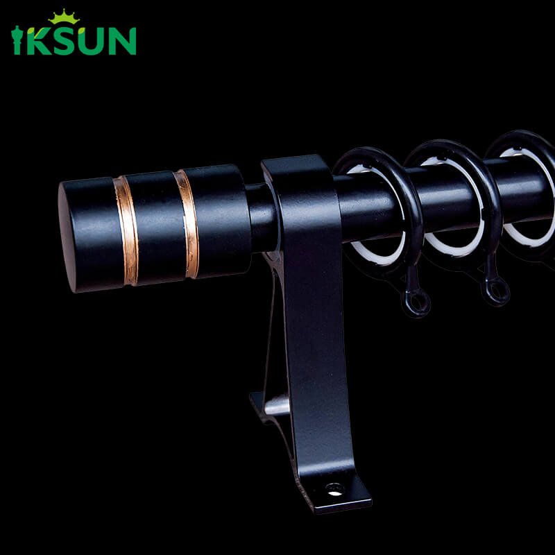 Black aluminum single curtain rod on a black background, stylish appearance with cylindrical finial design.