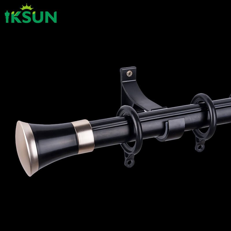 Black aluminum single curtain rod on a black background, sturdy construction suitable for heavy curtains.