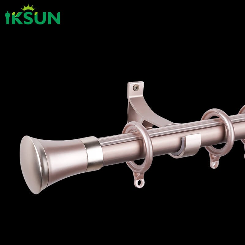Rose gold aluminum single curtain rod on a black background, sturdy construction suitable for heavy curtains.