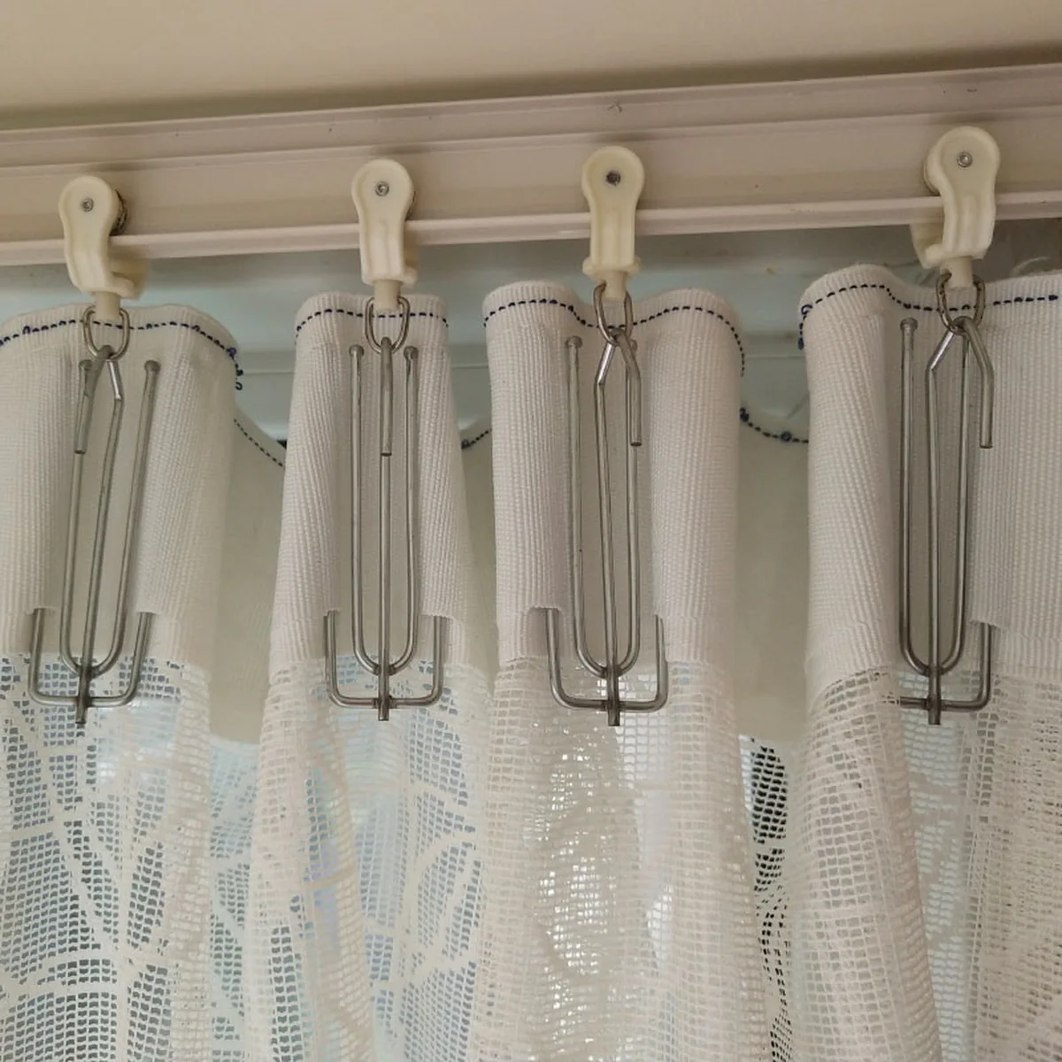 IKSUN curtain hooks installed on curtain track with sheer curtains