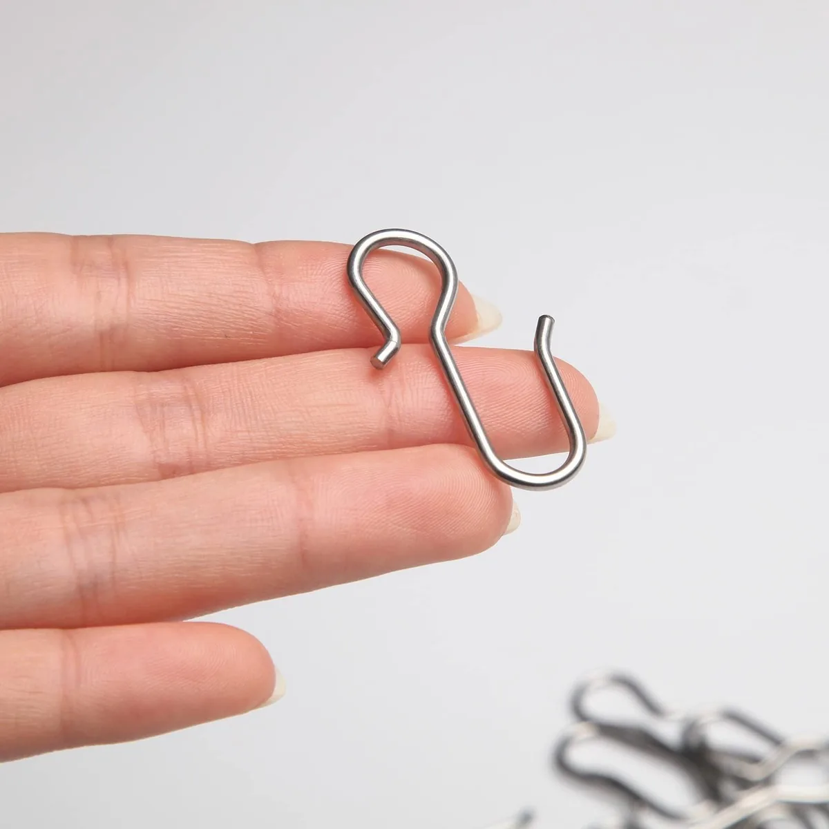 IKSUN stainless steel curtain S hook held in hand showing wire size and neck shape